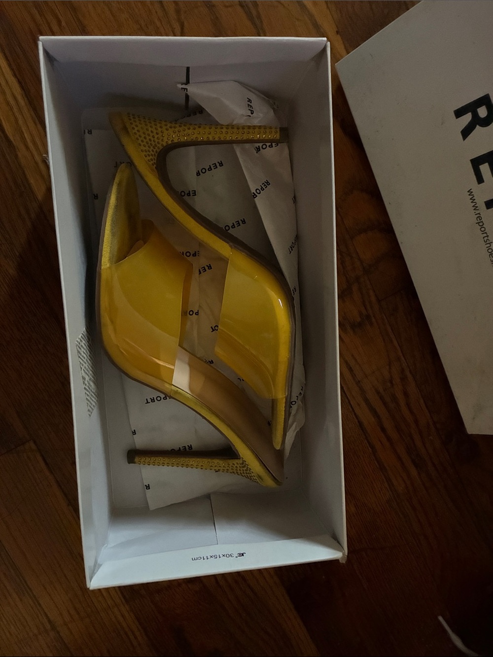 bebe Yellow Patent Vinyl High Heel Slide with Studded Stiletto